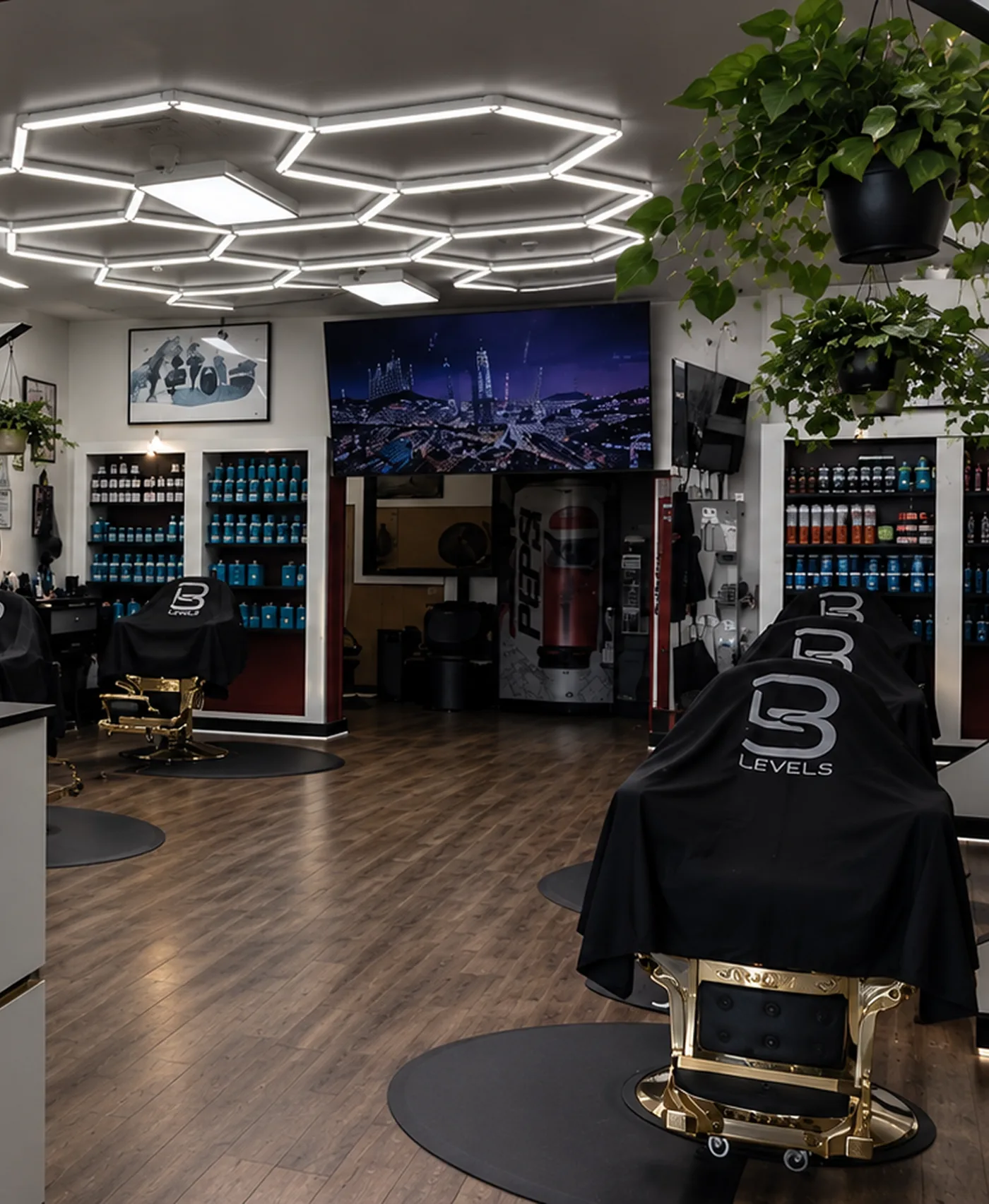 The Jireh salon with hexagonal ceiling lights and barber chairs